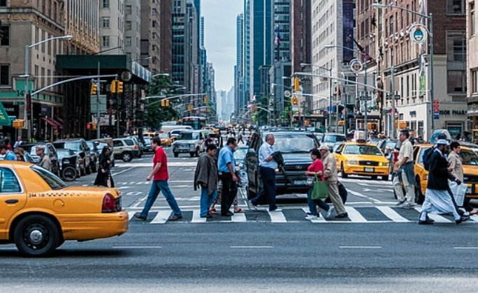 Busy NYC crosswalk highlighting pedestrian safety concerns in 2025